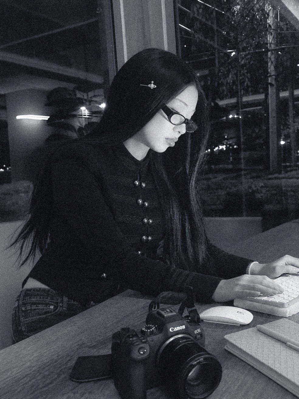 Hana, Seattle photographer and founder of Sunday Office, at her desk at night